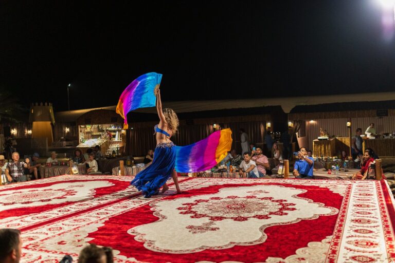 Belly dance performance during dinner at a Bedouin desert camp near Dubai